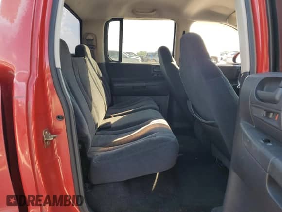 2003 Dodge Dakota SLT с VIN 1D7HG48NX3S122448, выставлен на аукционе Copart как лот 69306905 с пробегом 201 755 миль миль и Списание • Salvage title. История ставок и продаж доступна на DreamBid. Изображение 10.