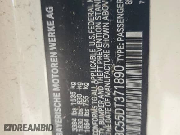 2013 MINI Hardtop with VIN WMWSU3C55DT371890, listed as a Copart auction lot 55992405 with 77,074 mi miles and Salvage title. Bid and sale history available at DreamBid. Image 12.
