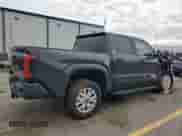 2024 Toyota Tacoma SR5 with VIN 3TMLB5JN0RM071045, listed as a Copart auction lot 70163855 with 8,616 mi miles and Salvage title. Bid and sale history available at DreamBid. Image 3.