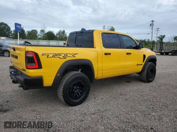 2023 Ram 1500 TRX z VIN 1C6SRFU92PN546863, wystawiony jako Copart lot #69499245 z przebiegiem 20 931 mil mil oraz Szkoda całkowita • Salvage title. Historia ofert i sprzedaży dostępna na DreamBid. Obrazek 3.