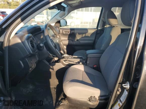 2023 Toyota Tacoma SR с VIN 3TMCZ5AN1PM589920, выставлен на аукционе Copart как лот 81328205 с пробегом 67 306 миль миль и Списание • Salvage title. История ставок и продаж доступна на DreamBid. Изображение 7.