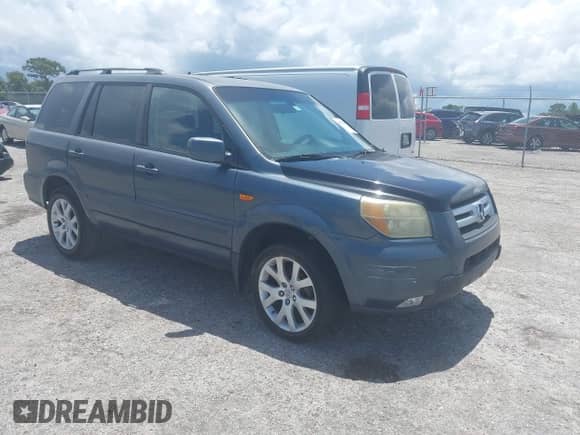 2006 Honda Pilot EX with VIN 5FNYF28426B031782, listed as a IAAI auction lot 42972105 with 207,318 mi miles and . Bid and sale history available at DreamBid. Image 1.