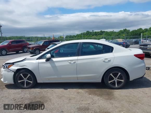 2019 Subaru Impreza Premium with VIN 4S3GKAD60K3617042, listed as a IAAI auction lot 42296679 with 55,522 mi miles and . Bid and sale history available at DreamBid. Image 14.