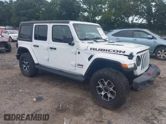 2021 Jeep Wrangler Unlimited Rubicon with VIN 1C4HJXFG9MW714239, listed as a IAAI auction lot 42874381 with 81,545 mi miles and . Bid and sale history available at DreamBid. Image 1.