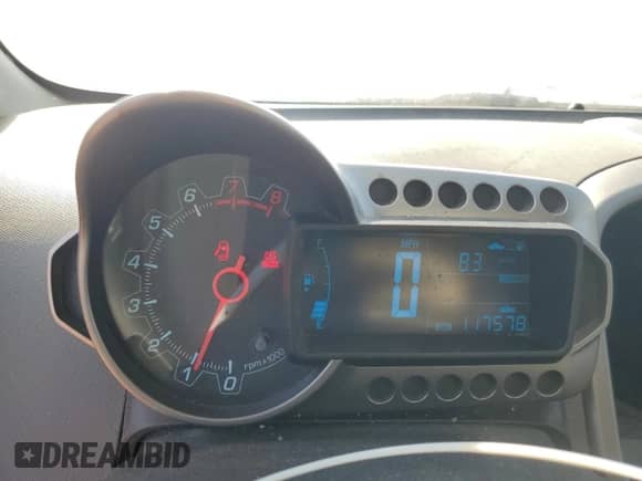 2012 Chevrolet Sonic LT z VIN 1G1JD6SH6C4219209, wystawiony jako Copart lot #69322235 z przebiegiem 117 578 mil mil oraz Szkoda całkowita • Salvage title. Historia ofert i sprzedaży dostępna na DreamBid. Obrazek 9.