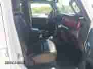 2021 Jeep Wrangler Unlimited Rubicon with VIN 1C4HJXFG5MW586842, listed as a IAAI auction lot 42186683 with 76,450 mi miles and . Bid and sale history available at DreamBid. Image 5.