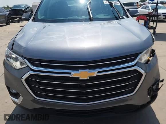 2018 Chevrolet Traverse LT Cloth z VIN 1GNEVGKWXJJ184044, wystawiony jako Copart lot #71991685 z przebiegiem 124 061 mil mil oraz Czysty tytuł • Clean title. Historia ofert i sprzedaży dostępna na DreamBid. Obrazek 14.