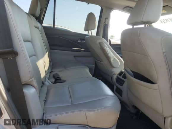 2019 Honda Pilot Touring 8-Passenger z VIN 5FNYF6H90KB008028, wystawiony jako Copart lot #66518825 z przebiegiem 90 735 mil mil oraz Szkoda całkowita • Salvage title. Historia ofert i sprzedaży dostępna na DreamBid. Obrazek 11.