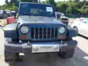 2008 Jeep Wrangler Unlimited Sahara with VIN 1J4GA59128L607591, listed as a IAAI auction lot 42959722 with 129,564 mi miles and . Bid and sale history available at DreamBid. Image 12.