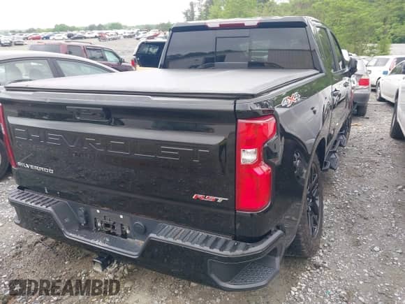 2023 Chevrolet Silverado 1500 RST with VIN 1GCUDEED2PZ130558, listed as a IAAI auction lot 42103254 with 50,150 mi miles and . Bid and sale history available at DreamBid. Image 4.