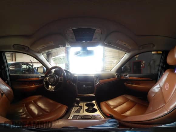 2012 Jeep Grand Cherokee Overland z VIN 1C4RJFCG1CC262788, wystawiony jako IAAI lot #43212743 z przebiegiem 211 731 mil mil oraz . Historia ofert i sprzedaży dostępna na DreamBid. Obrazek 21.