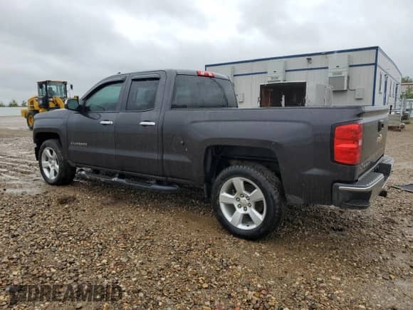 2015 Chevrolet Silverado 1500 Work Truck with VIN 1GCRCPEC5FZ429584, listed as a Copart auction lot 57485365 with 100,671 mi miles and Salvage title. Bid and sale history available at DreamBid. Image 2.