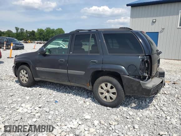 2003 Chevrolet TrailBlazer LS z VIN 1GNDS13S032236131, wystawiony jako Copart lot #66608685 z przebiegiem Nie podano mil oraz Szkoda całkowita • Salvage title. Historia ofert i sprzedaży dostępna na DreamBid. Obrazek 2.