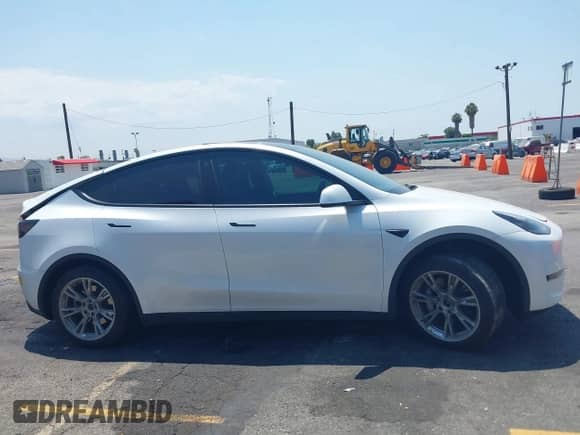 2023 Tesla Model Y Long Range с VIN 7SAYGDEE8PA034371, выставлен на аукционе IAAI как лот 42765729 с пробегом Не указан миль и . История ставок и продаж доступна на DreamBid. Изображение 12.