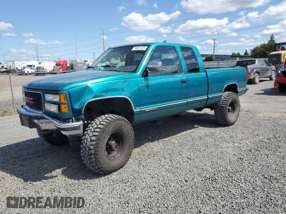 1994 GMC Sierra 1500 с VIN 1GTEK19K7RE564545, выставлен на аукционе Copart как лот 59007525 с пробегом 210 044 миль миль и Списание • Salvage title. История ставок и продаж доступна на DreamBid. Изображение 1.