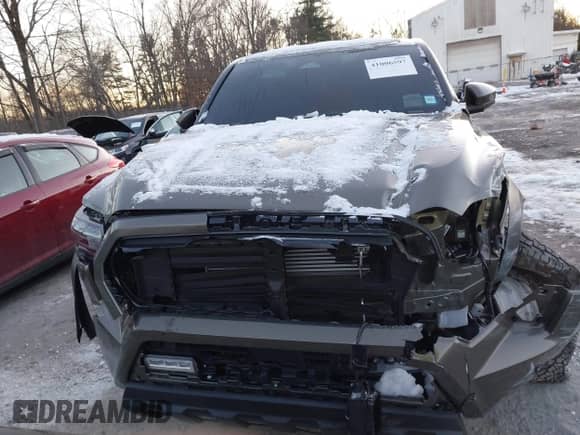 2024 Toyota Tacoma SR5 with VIN 3TMLB5JN9RM046175, listed as a IAAI auction lot 41006597 with 6,139 mi miles and . Bid and sale history available at DreamBid. Image 12.