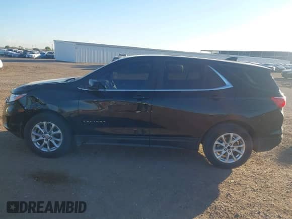 2021 Chevrolet Equinox LT z VIN 3GNAXKEV2ML401632, wystawiony jako IAAI lot #43182422 z przebiegiem 59 429 mil mil oraz . Historia ofert i sprzedaży dostępna na DreamBid. Obrazek 14.