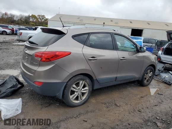 2013 Hyundai Tucson GLS с VIN KM8JUCAC5DU566734, выставлен на аукционе Copart как лот 90823465 с пробегом 170 827 миль миль и Чистый • Clean title. История ставок и продаж доступна на DreamBid. Изображение 3.