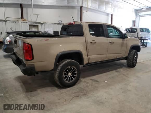 2021 Chevrolet Colorado 4WD ZR2 с VIN 1GCGTEEN4M1260750, выставлен на аукционе Copart как лот 66843155 с пробегом 49 174 миль миль и Списание • Salvage title. История ставок и продаж доступна на DreamBid. Изображение 3.