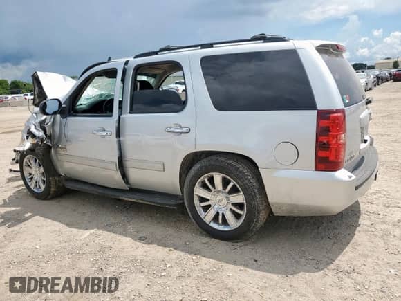 2012 Chevrolet Tahoe LS with VIN 1GNSCAE07CR324228, listed as a Copart auction lot 62649415 with Not provided miles and Salvage title. Bid and sale history available at DreamBid. Image 2.