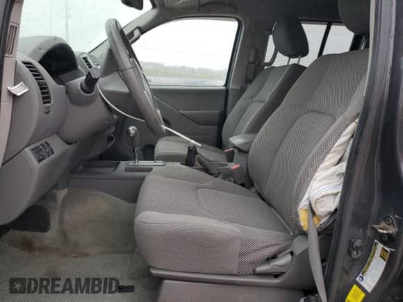 2015 Nissan Frontier SV with VIN 1N6AD0EV2FN737559, listed as a Copart auction lot 70682185 with 87,616 mi miles and Salvage title. Bid and sale history available at DreamBid. Image 7.