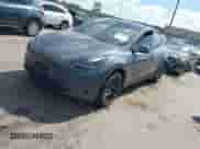2023 Tesla Model Y Long Range with VIN 7SAYGDEE8PA163534, listed as a IAAI auction lot 42795393 with 45,172 mi miles and . Bid and sale history available at DreamBid. Image 2.