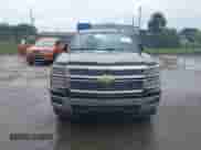 2015 Chevrolet Silverado 1500 LT z VIN 1GCRCREH3FZ410460, wystawiony jako IAAI lot #42719961 z przebiegiem 128 301 mil mil oraz . Historia ofert i sprzedaży dostępna na DreamBid. Obrazek 6.
