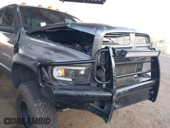 2005 Dodge 2500 SLT z VIN 3D7KS28C15G778863, wystawiony jako IAAI lot #42520642 z przebiegiem 193 811 mil mil oraz . Historia ofert i sprzedaży dostępna na DreamBid. Obrazek 6.