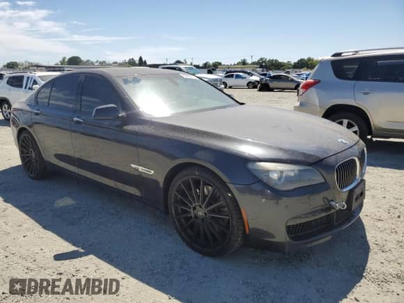 2012 BMW 7 Series 750i xDrive with VIN WBAKC6C5XCC397162, listed as a Copart auction lot 60833375 with 139,712 mi miles and Clean title. Bid and sale history available at DreamBid. Image 4.
