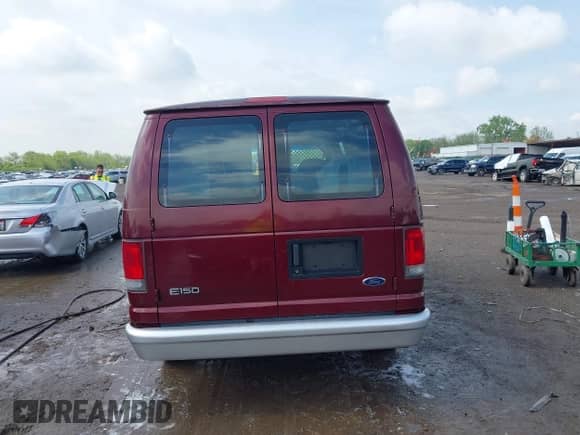 2004 Ford Econoline Cargo with VIN 1FTRE14W04HA33858, listed as a IAAI auction lot 42208787 with 92,012 mi miles and . Bid and sale history available at DreamBid. Image 16.