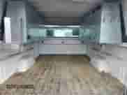 2013 Chevrolet Silverado 1500 Work Truck z VIN 1GCNCPEX2DZ151886, wystawiony jako Copart lot #58527265 z przebiegiem Nie podano mil oraz Czysty tytuł • Clean title. Historia ofert i sprzedaży dostępna na DreamBid. Obrazek 10.