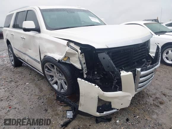 2015 Cadillac Escalade ESV Premium with VIN 1GYS4TKJ6FR708255, listed as a IAAI auction lot 42244621 with 31,407 mi miles and . Bid and sale history available at DreamBid. Image 6.