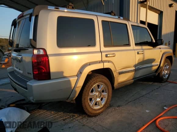 2008 Jeep Commander Limited with VIN 1J8HG58N18C124955, listed as a Copart auction lot 73711314 with 175,184 mi miles and Salvage title. Bid and sale history available at DreamBid. Image 3.