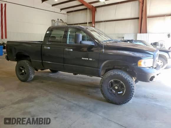 2004 Dodge 1500 SLT with VIN 1D7HU18D64S541543, listed as a Copart auction lot 84190665 with 301,451 mi miles and Clean title. Bid and sale history available at DreamBid. Image 4.