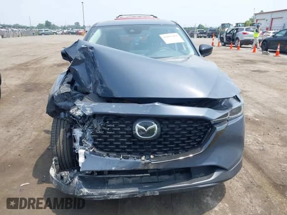 2024 Mazda CX-5 S Preferred z VIN JM3KFBCL5R0487533, wystawiony jako IAAI lot #42493484 z przebiegiem 6 791 mil mil oraz . Historia ofert i sprzedaży dostępna na DreamBid. Obrazek 13.