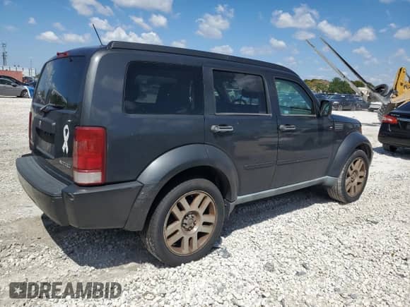 2010 Dodge Nitro Heat with VIN 1D4PT4GK9AW156916, listed as a Copart auction lot 50803765 with 141,028 mi miles and Clean title. Bid and sale history available at DreamBid. Image 3.
