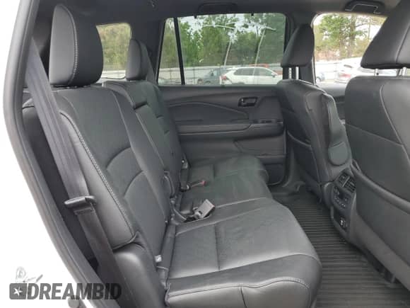 2023 Honda Passport Elite с VIN 5FNYF8H06PB022732, выставлен на аукционе Copart как лот 56893845 с пробегом 33 620 миль миль и Списание • Salvage title. История ставок и продаж доступна на DreamBid. Изображение 11.