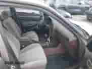 1996 Toyota Camry LE z VIN 4T1BF12KXTU140593, wystawiony jako IAAI lot #43025305 z przebiegiem 112 167 mil mil oraz . Historia ofert i sprzedaży dostępna na DreamBid. Obrazek 5.