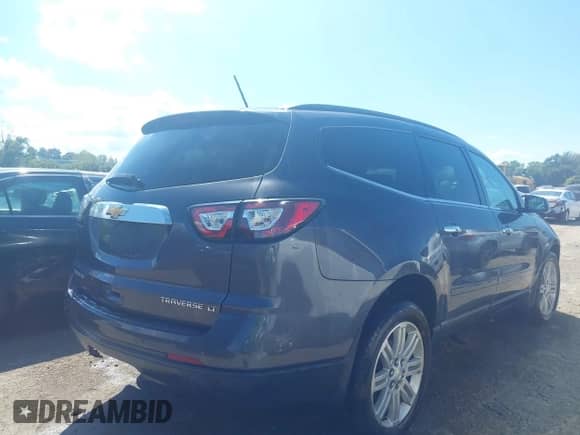 2013 Chevrolet Traverse LT z VIN 1GNKRGKD4DJ243857, wystawiony jako IAAI lot #43115439 z przebiegiem 198 745 mil mil oraz . Historia ofert i sprzedaży dostępna na DreamBid. Obrazek 4.