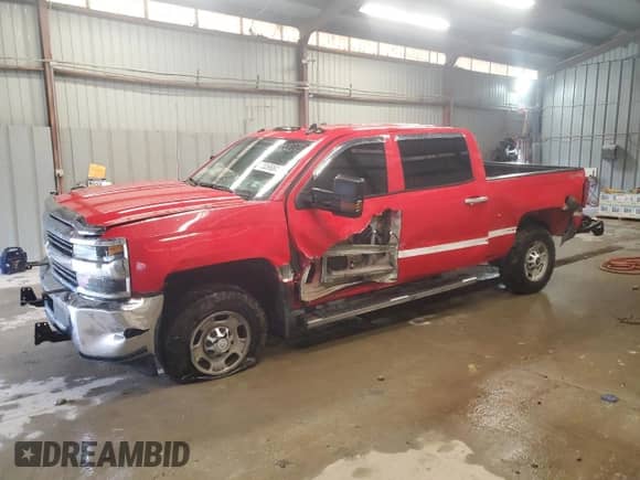 2017 Chevrolet Silverado 2500HD Work Truck z VIN 1GC1KUEG4HF100199, wystawiony jako Copart lot #72059064 z przebiegiem 102 158 mil mil oraz Szkoda całkowita • Salvage title. Historia ofert i sprzedaży dostępna na DreamBid. Obrazek 1.