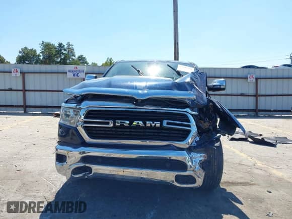2020 Ram 1500 Lone Star z VIN 1C6RREFT8LN133969, wystawiony jako IAAI lot #43192733 z przebiegiem Nie podano mil oraz . Historia ofert i sprzedaży dostępna na DreamBid. Obrazek 12.