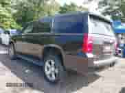 2018 Chevrolet Tahoe LT with VIN 1GNSKBKC4JR156035, listed as a IAAI auction lot 43009937 with 152,555 mi miles and . Bid and sale history available at DreamBid. Image 3.