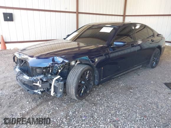 2022 BMW 7 Series 750i xDrive with VIN WBA7U2C06NCJ33827, listed as a IAAI auction lot 42712867 with 55,469 mi miles and . Bid and sale history available at DreamBid. Image 2.