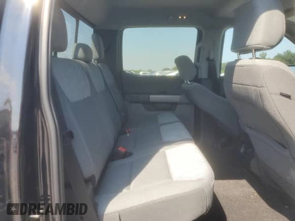 2023 Ford F-150 XL z VIN 1FTFW1E57PKG14075, wystawiony jako Copart lot #71424865 z przebiegiem 19 301 mil mil oraz Szkoda całkowita • Salvage title. Historia ofert i sprzedaży dostępna na DreamBid. Obrazek 10.