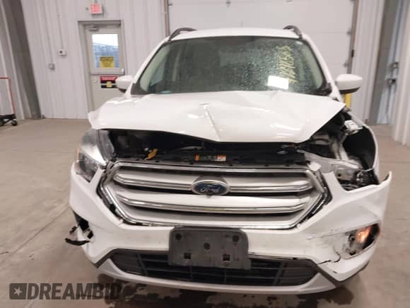 2018 Ford Escape SE z VIN 1FMCU9GD6JUC77191, wystawiony jako IAAI lot #42298565 z przebiegiem 68 806 mil mil oraz . Historia ofert i sprzedaży dostępna na DreamBid. Obrazek 13.
