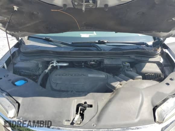 2016 Honda Pilot LX z VIN 5FNYF6H17GB024521, wystawiony jako Copart lot #65635625 z przebiegiem 168 863 mil mil oraz Szkoda całkowita • Salvage title. Historia ofert i sprzedaży dostępna na DreamBid. Obrazek 11.