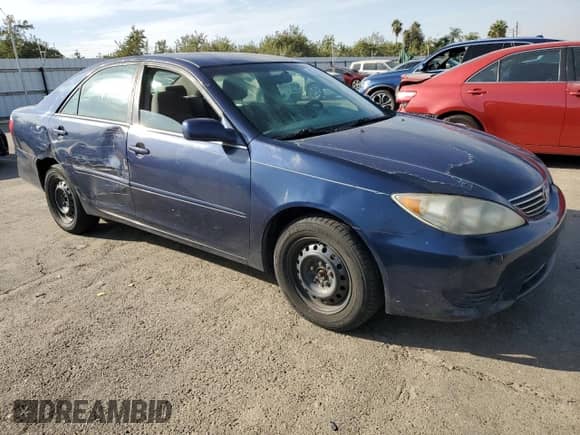 2005 Toyota Camry LE с VIN 4T1BE30K95U412300, выставлен на аукционе Copart как лот 81341765 с пробегом 307 894 миль миль и Списание • Salvage title. История ставок и продаж доступна на DreamBid. Изображение 4.