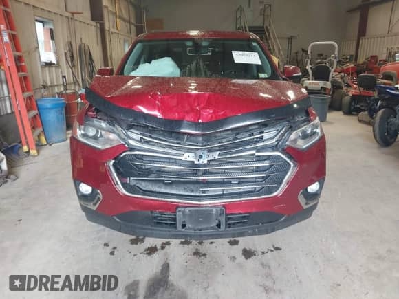 2019 Chevrolet Traverse LT Cloth z VIN 1GNERGKW8KJ307054, wystawiony jako IAAI lot #43052213 z przebiegiem 89 762 mil mil oraz . Historia ofert i sprzedaży dostępna na DreamBid. Obrazek 12.
