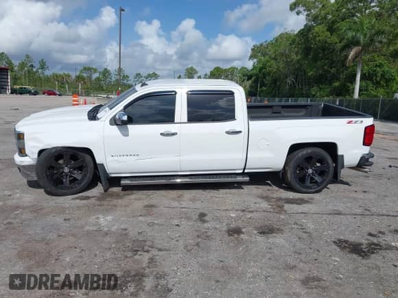 2014 Chevrolet Silverado 1500 LT with VIN 3GCUKREC4EG165040, listed as a IAAI auction lot 42496096 with 145,527 mi miles and . Bid and sale history available at DreamBid. Image 15.