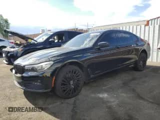 2017 BMW 7 Series 740i with VIN WBA7E2C35HG740886, listed as a Copart auction lot 71104735 with 142,103 mi miles and Clean title. Bid and sale history available at DreamBid. Image 1.